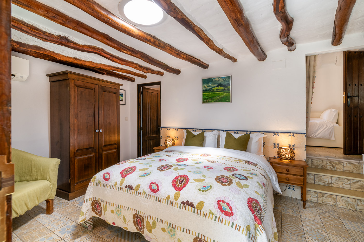 Bedroom 1 (Almond) with steps to adjoining single room